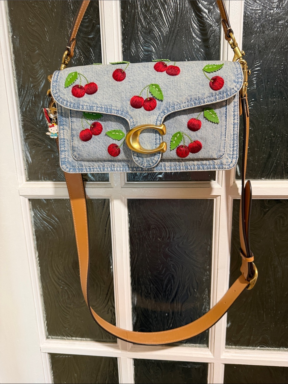 Coach Denim Mini Shoulder Bag with Red Cherry Embroidery and Tan Strap